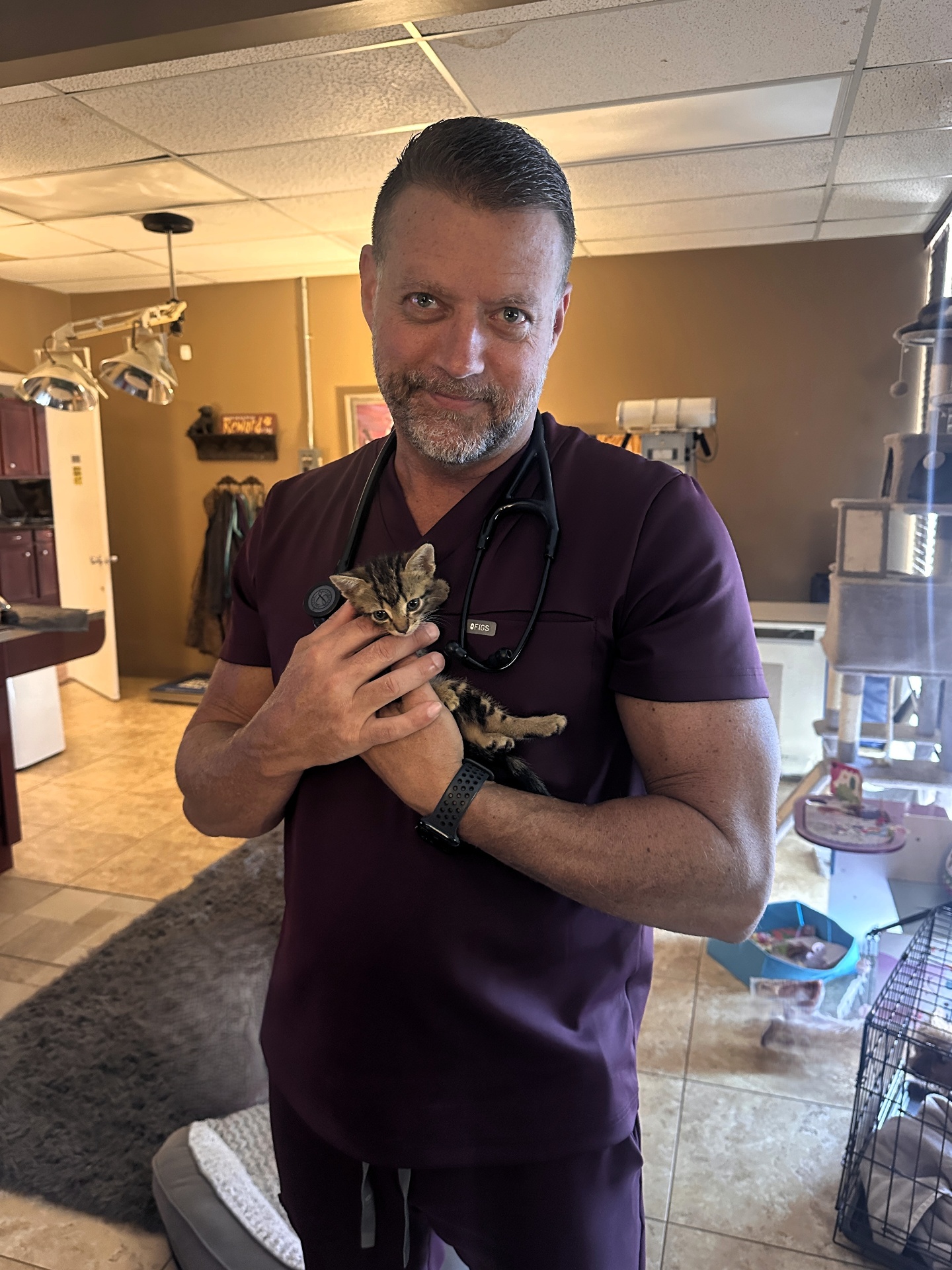 Dr. Pelton holding a kitten