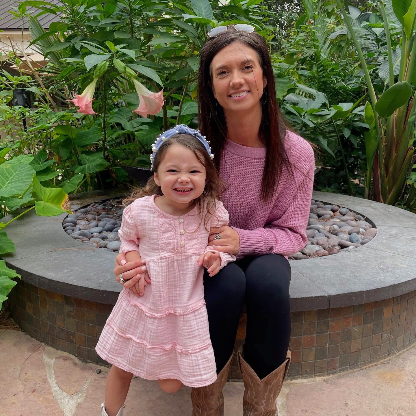 Stephanie with her daughter Maverick, family time outside of work at Hearthstone Animal Clinic